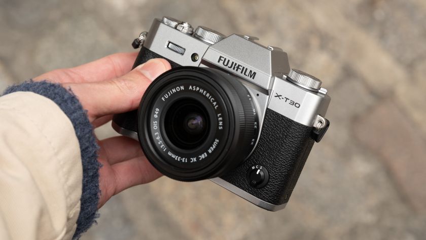 Fujifilm X-T30 III camera held in a hand
