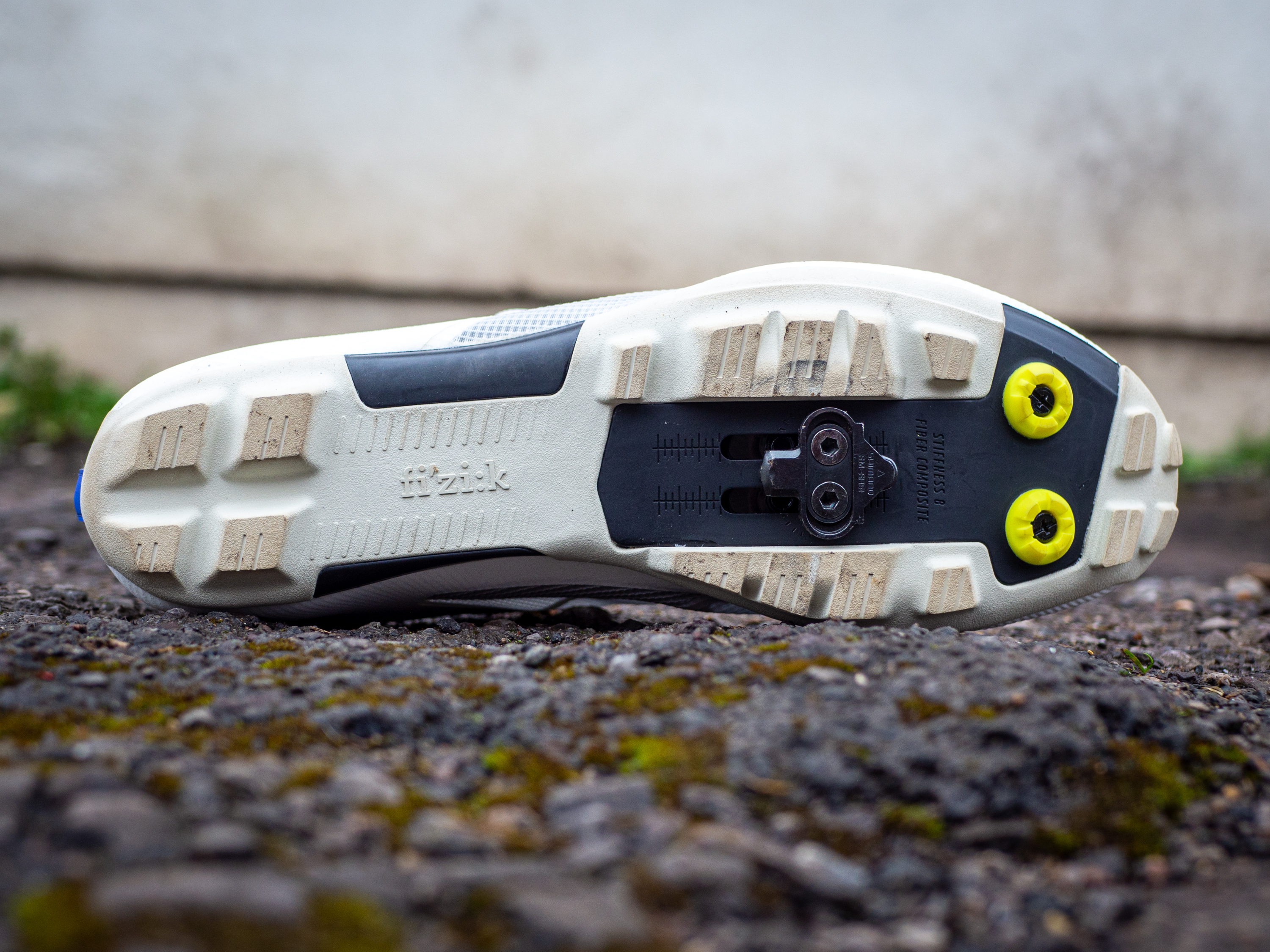A white pair of Fizik Vento Proxy gravel shoes