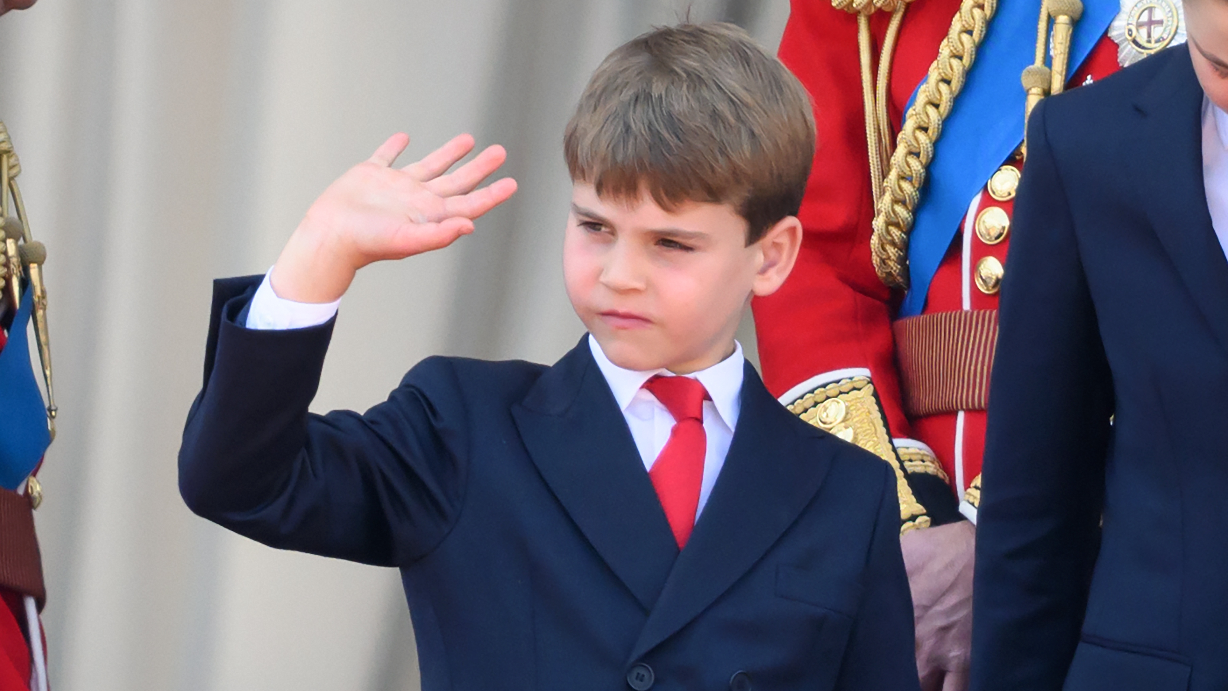 Prince Louis of Wales waves on the balcony of Buckingham Palace during Trooping The Colour 2025