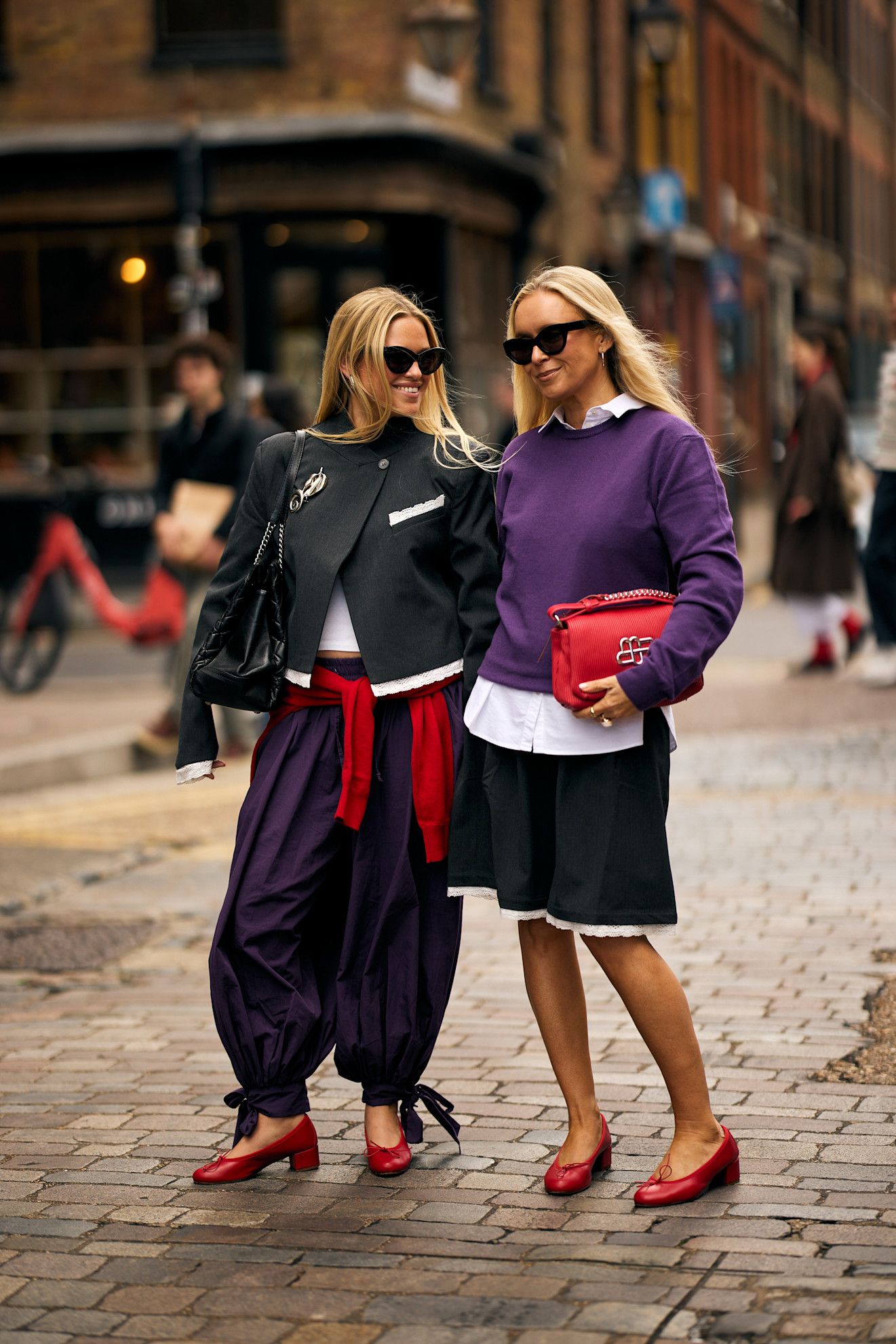 women wearing purple and red clothing