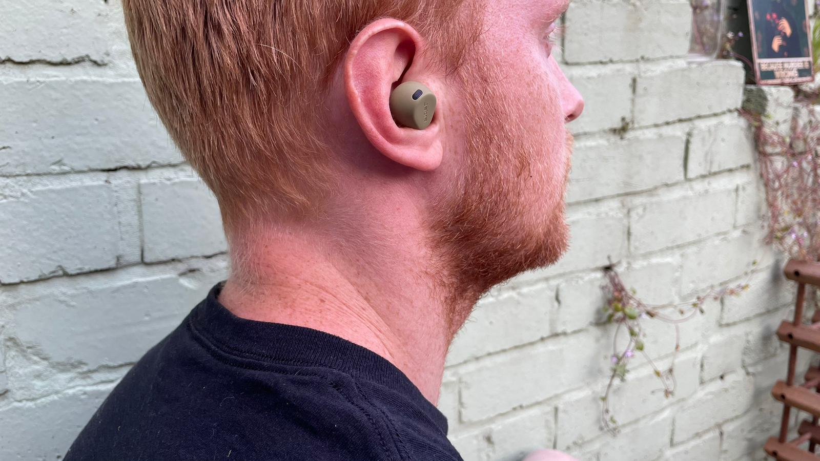 Writer Harry Bullmore wearing the Jabra Elite 8 Active Gen 2 earbuds