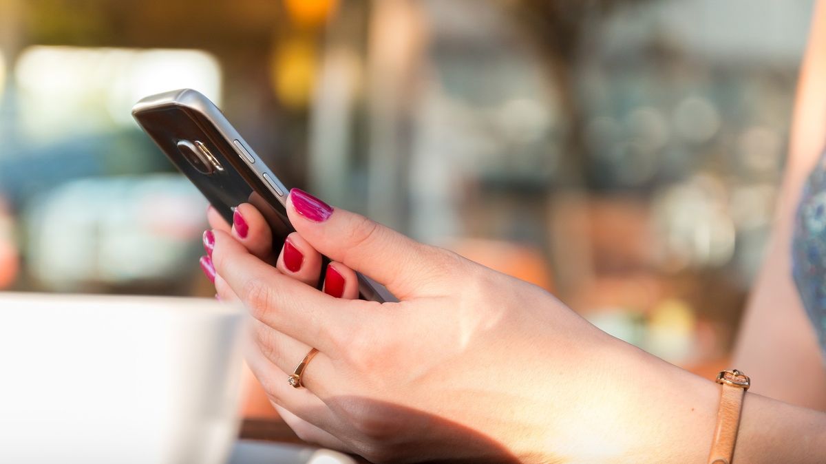 Woman holding a smartphone