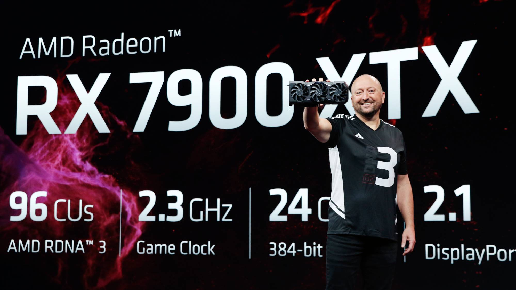 AMD's Scott Herkelman holds the Radeon RX 7900 XTX graphics card
