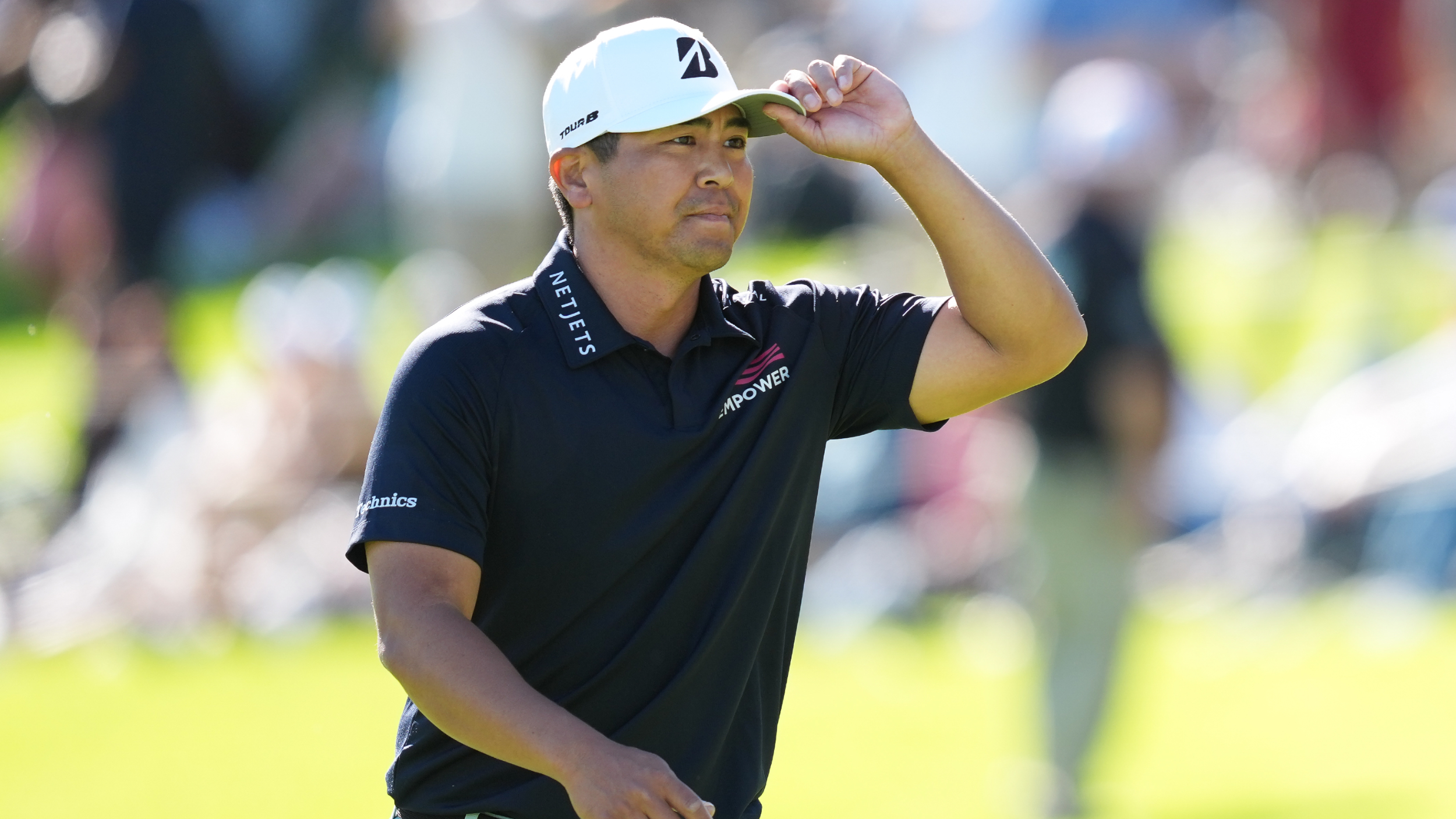 Kurt Kitayama acknowledges the fans at the Genesis Invitational