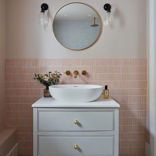 Bamboo Porcelain Mosaic Blush tile behind white vanity unit and sink