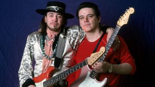 American singer, songwriter and Texas blues guitar legend Stevie Ray Vaughan and his brother, American blues-rock guitarist, singer and founder of The Fabulous Thunderbirds Jimmie Vaughan, pose backstage at the Royal Oak Music Theater during the "Soul to Soul" world tour, on February 14, 1986.