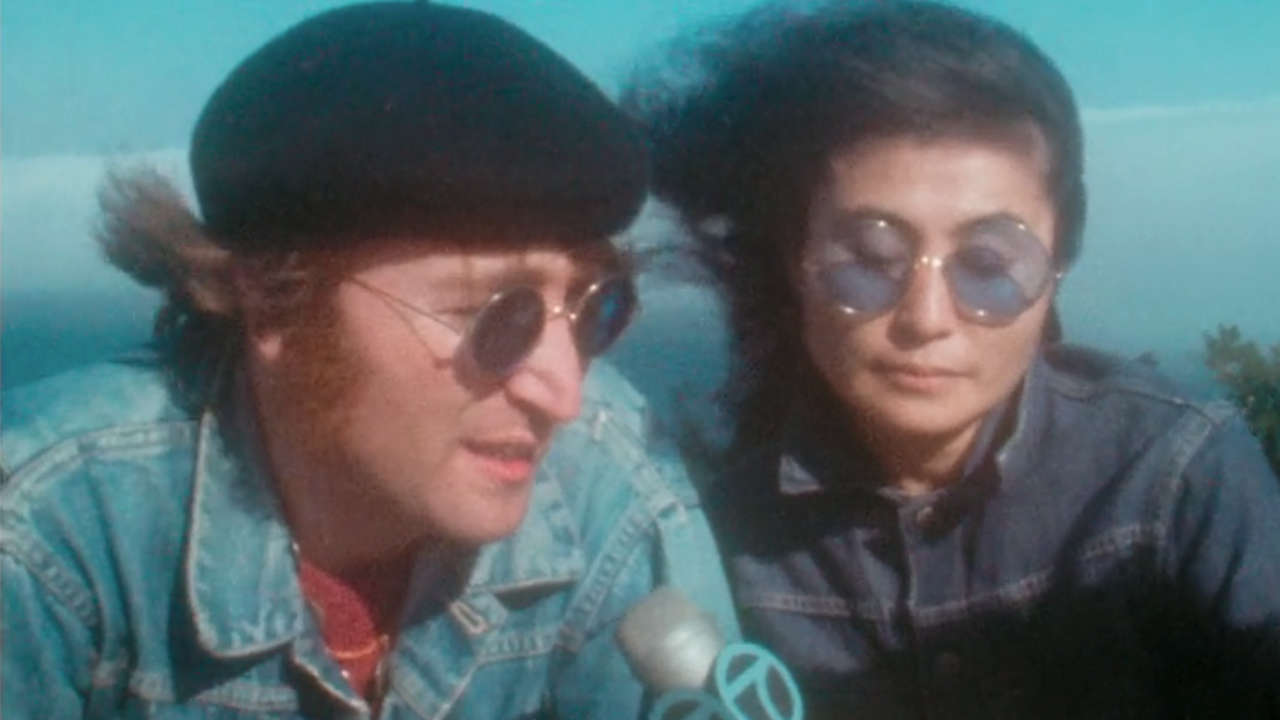 John Lennon and Yoko Ono in a news interview