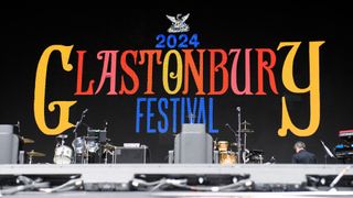 The backdrop of the Pyramid Stage with the Glastonbury 2024 logo.