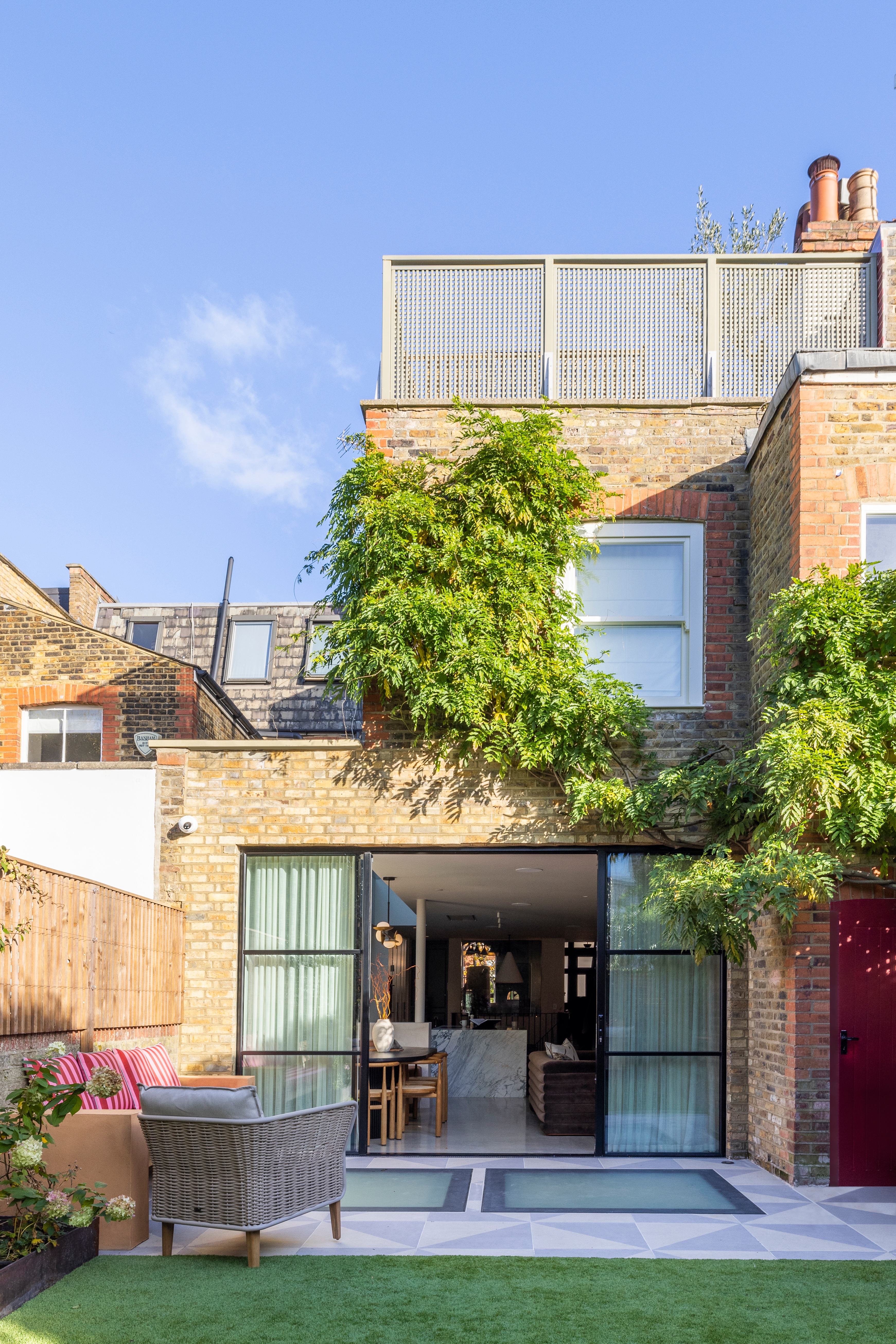modern brick house with icy and outdoor seating