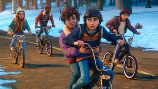 A still from "Stranger Things: Tales From '85" that shows the gang riding through Hawkins on their bikes.