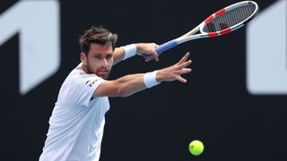 Cameron Norrie eyes up a forehand at the AO 2024
