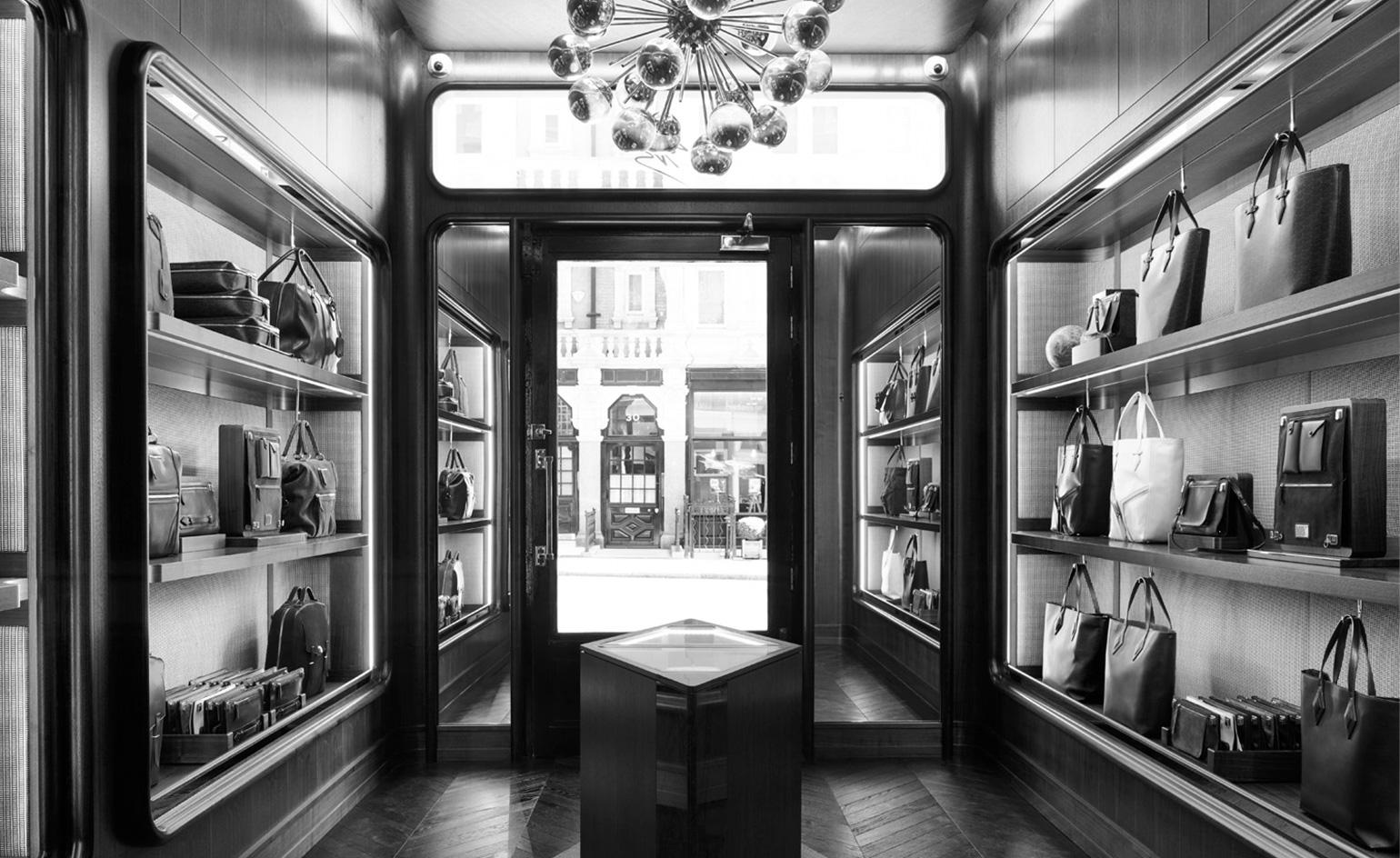 The store also plays on the brand’s signature diamond motif, featuring a diamond cut-out ceiling and a jewel shaped display case in its centre