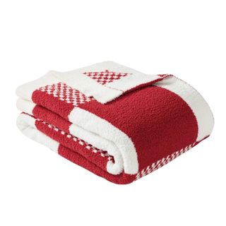 A folded red and white checkered blanket
