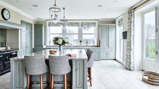 country kitchen with French doors with floral curtains