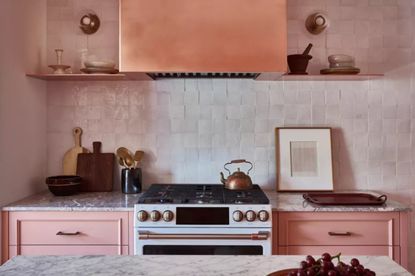 pink tile kitchen backsplash