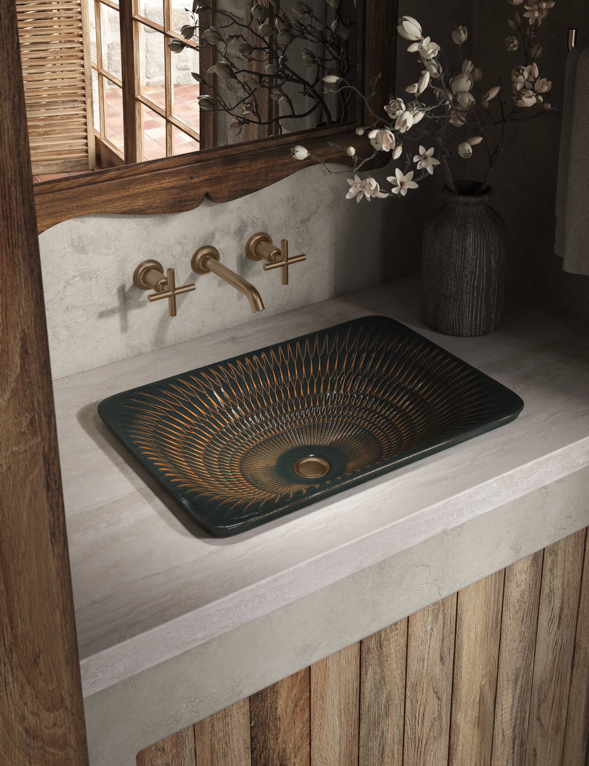 Jake Arnold x Kohler bronze sink basin and wall-in bronze styled in a rustic wooden bathroom vanity area