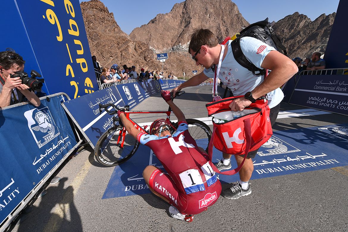 A tired Marcel Kittel collects himself at the finish