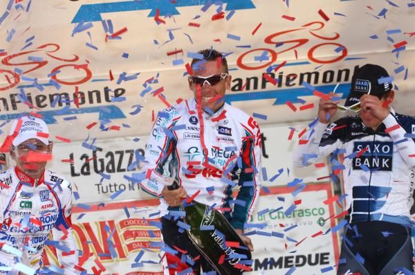 Philippe Gilbert (Omega Pharma-Lotto) celebrates on the podium