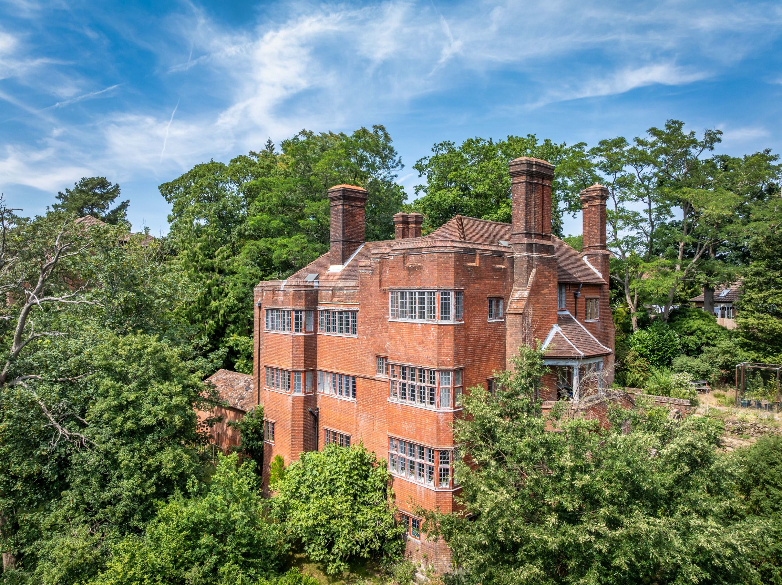 An iconic Surrey home created by Sir Edwin Lutyens has defied the property market — and it's not hard to see why