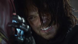 Bucky about to rip out Tony's arc reactor in Civil War.