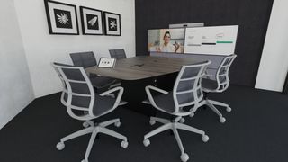 An empty huddle room with collaborative solutions set up. 