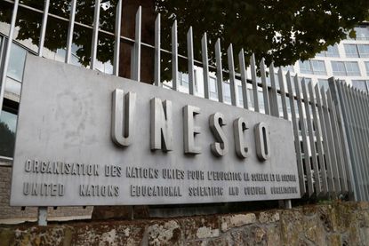 Unesco sign on gate