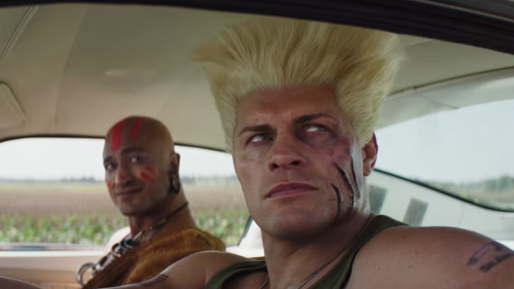 Cody Rhodes and Vidyut Jammwal sitting in a car together in Street Fighter