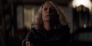 Laurie Strode pointing a gun Jamie Lee Curtis Halloween 2018