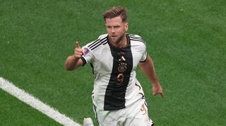 Niclas Fullkrug celebrates his goal for Germany against Spain at the World Cup in Qatar.