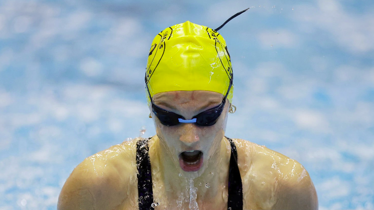 Canadian swimmer Summer McIntosh comes up for air mid-race in training for the swimming live stream at Olympics 2024 