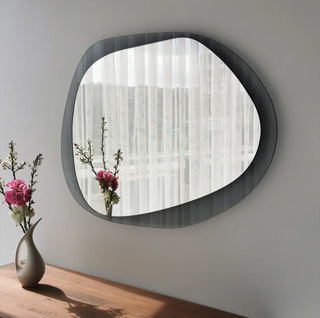 Asymmetrical wall mirror.