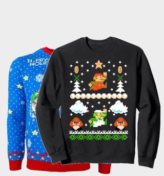 Two Nintendo Super Mario Christmas Sweaters on a plain background