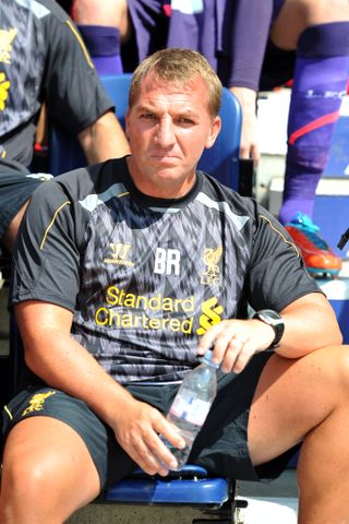 Rodgers models one of Liverpool's more adventurous technical kits during a pre-season friendly against Preston