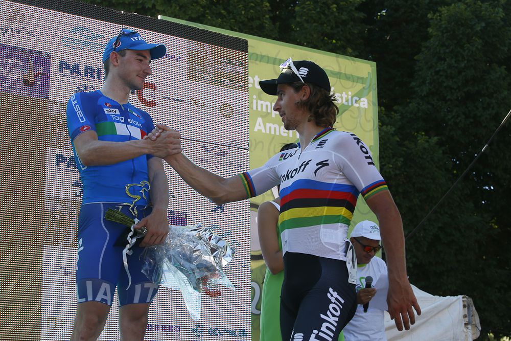 Elia Viviani and Peter Sagan greet each other on the stage 2 podium.
