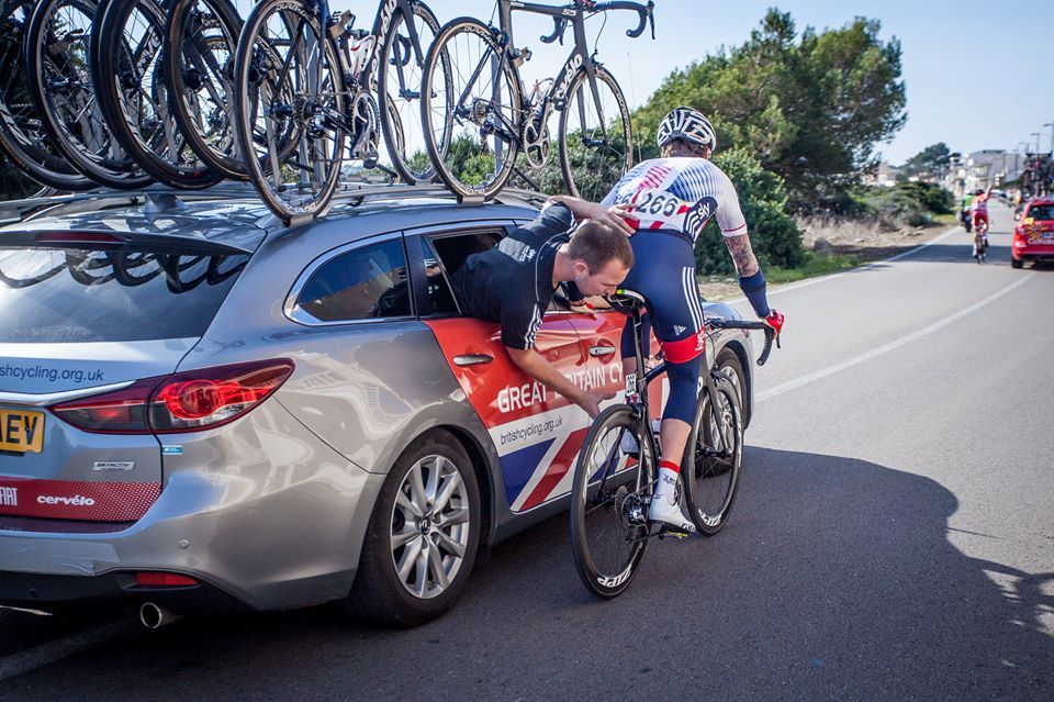 Bradley Wiggins gets some mechanical work during the race