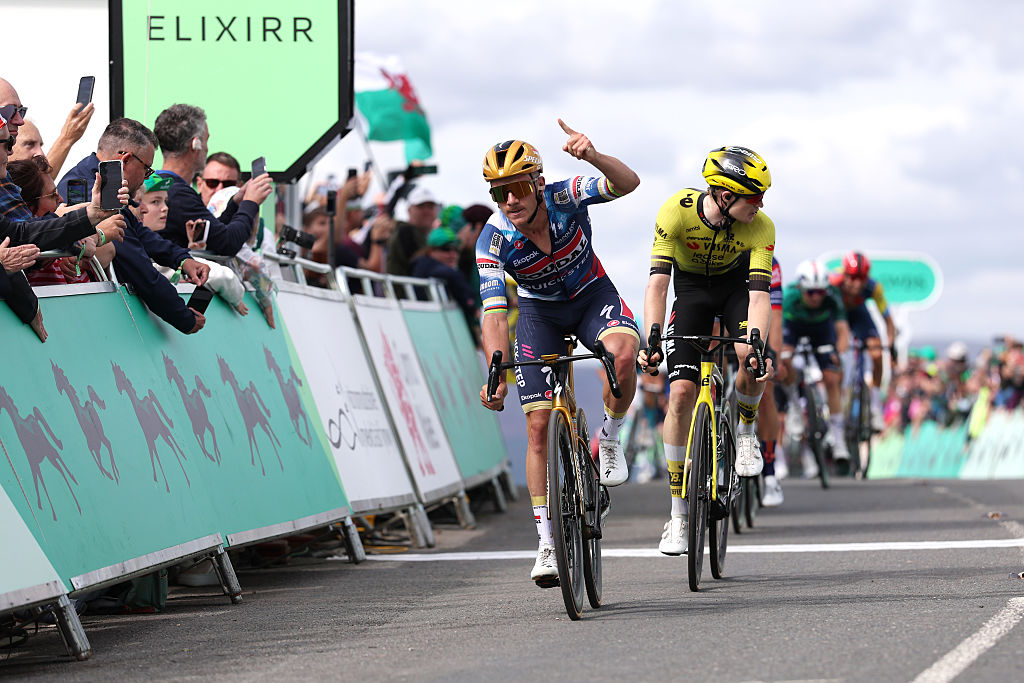 THE TUMBLE, UNITED KINGDOM - SEPTEMBER 06: (L-R) Remco Evenepoel of Belgium and Team Soudal Quick-Step celebrates at finish line as stage winner ahead of Thomas Gloag of Great Britain and Team Visma | Lease a Bike during the 21st Tour of Britain 2025, Stage 5 a 133.6km stage from Pontypool to The Tumble on September 06, 2025 in The Tumble, United Kingdom. (Photo by Alex Livesey/Getty Images)
