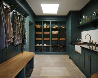 Dark green boot room idea by Martin Moore