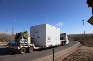 A truck carrying NASA's InSight spacecraft leaves Lockheed Martin Space in Denver, where the spacecraft was built and tested, on Feb. 28, 2018, headed for Buckley Air Force Base. At Buckley, InSight was loaded into a cargo plane, which flew it to Vandenberg Air Force Base in California.