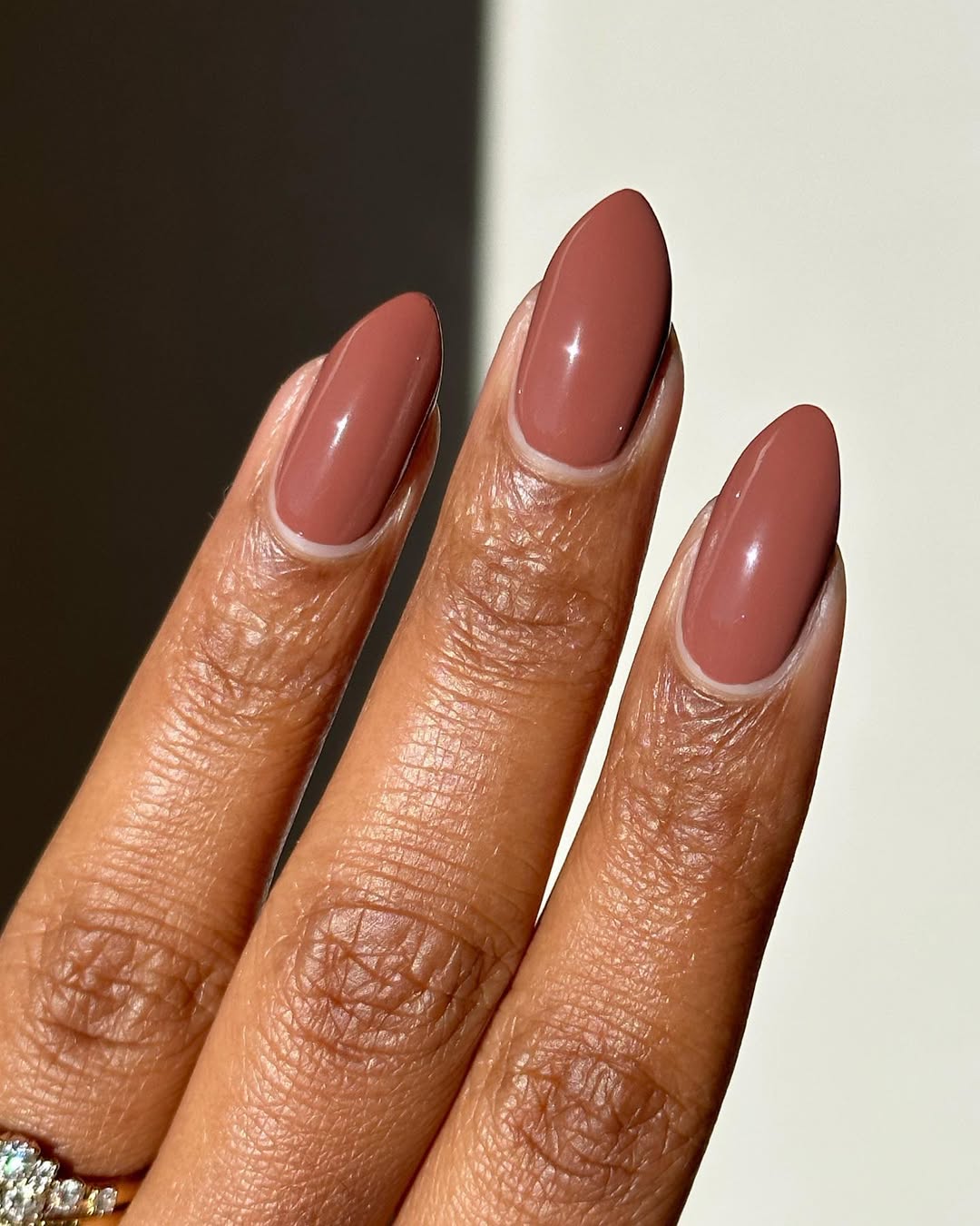 a light brown manicure