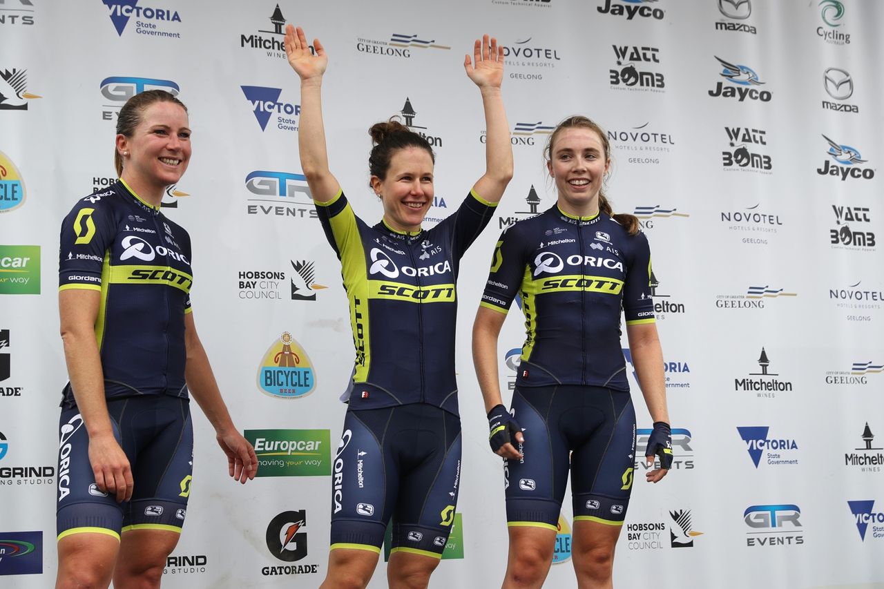 Amanda Spratt, middle, on the podium with her Orica-Scott teammates