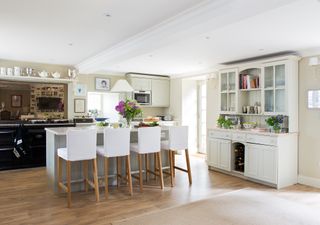 kitchen white cabinets breakfast bar flowers period home real home black aga