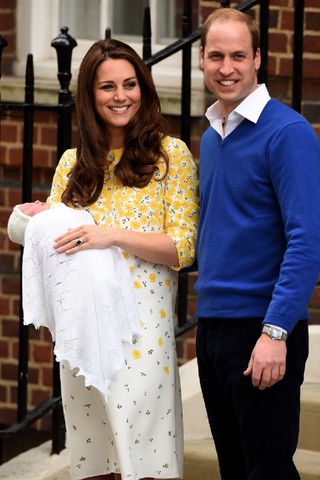 Catherine, Duchess of Cambridge and Prince William, Duke of Cambridge leave The Lindo Wing of St Mary's Hospital with their newborn daughter