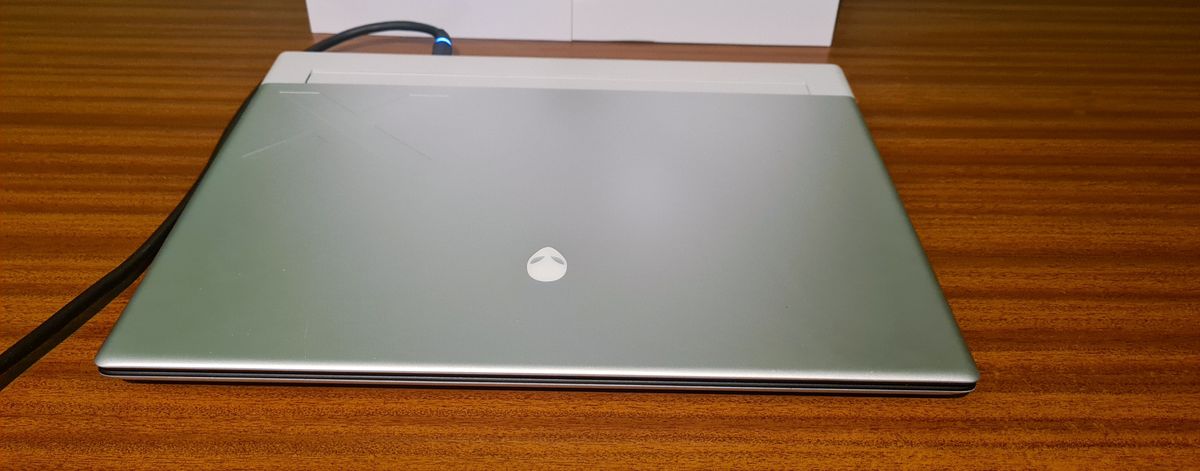 Alienware x16 on a wooden desk