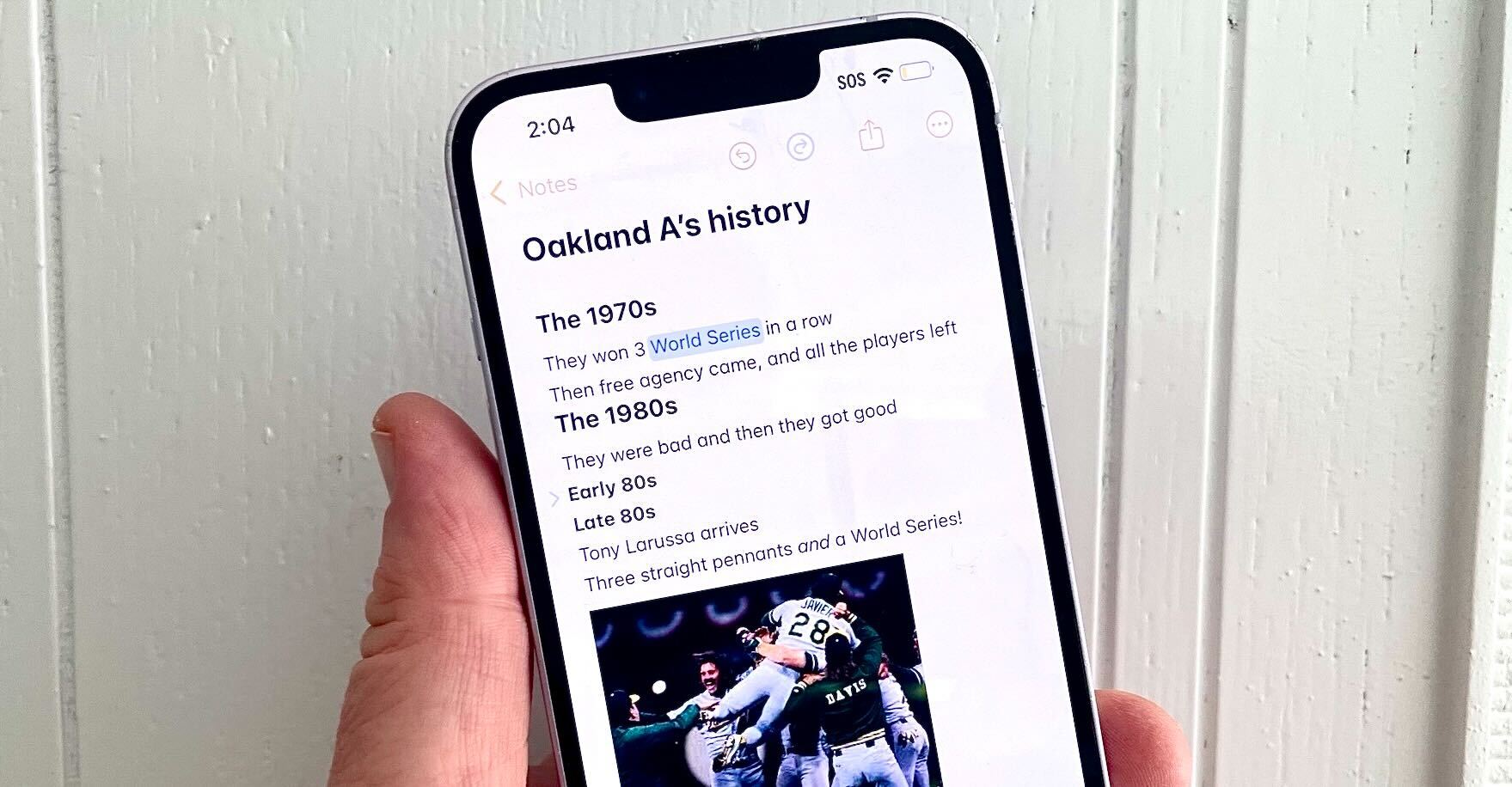 A note in iOS 18 with collapsible headings