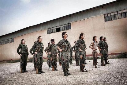 Thousands of Kurdish women are volunteering to battle against ISIS, others in Syria
