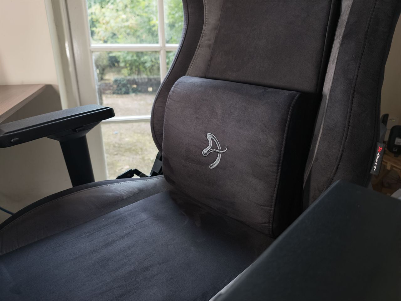Closeup of the Arozzi Vernazza Supersoft gaming chair's lumbar pillow