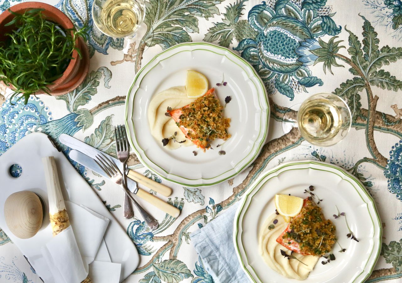 Aerial shot of salmon fillets with lemon wedge