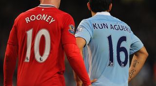 Manchester United's Wayne Rooney and Manchester City's Sergio Aguero in action during a derby match in April 2012.