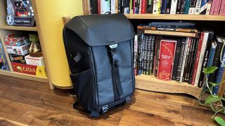 Mous Extreme Commuter backpack on a wooden floor in a living room