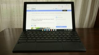 Asus Chromebook Detachable CM3 displaying LaptopMag.com